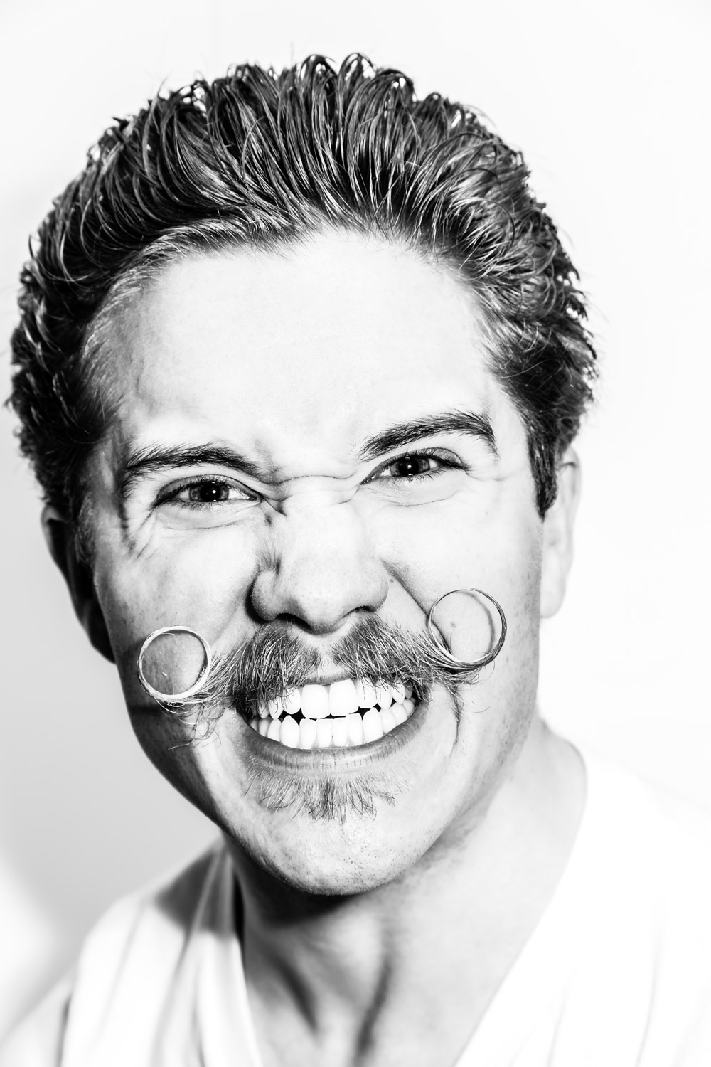 Photographer Dana J. Quigley and his “bicycle mustache.”