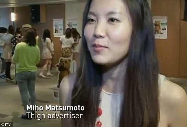 No problem: Miho Matsumoto says she is happy to have the ad on her thighs