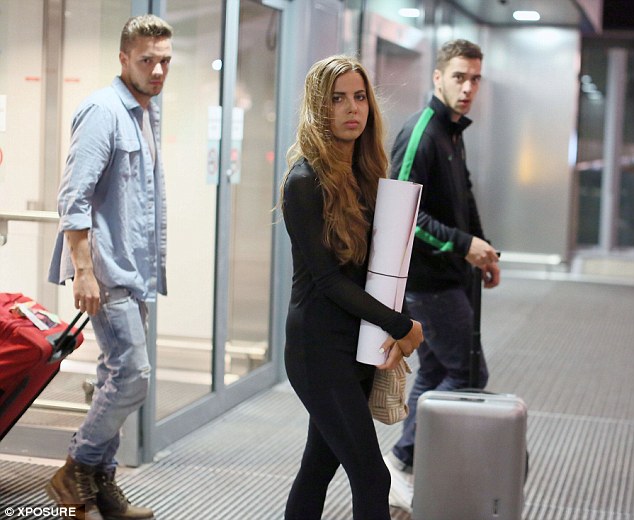 Jet-setters: Sophia looked like she had gone make-up free as she joined her boyfriend on the trip