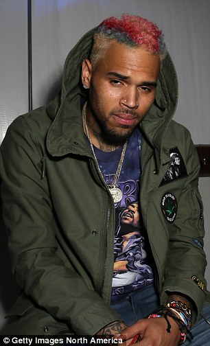 Lighten up: Chris Brown (L) went for rainbow back in April and the changing locks of 5 Seconds of Summer