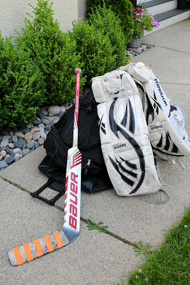 Hockey pads and hockey equipment to be cleaned.