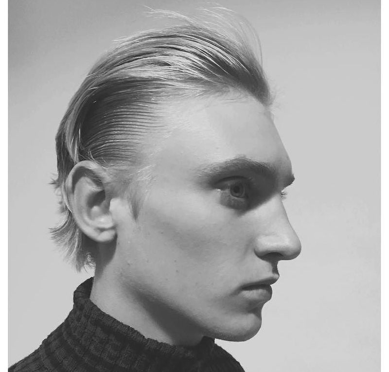 wet and dry slicked hairstyle