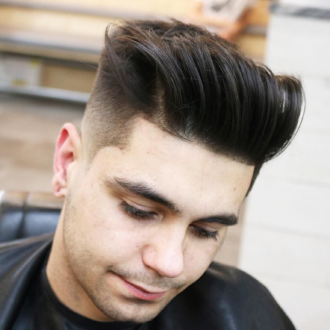 high fade and tall hair on top