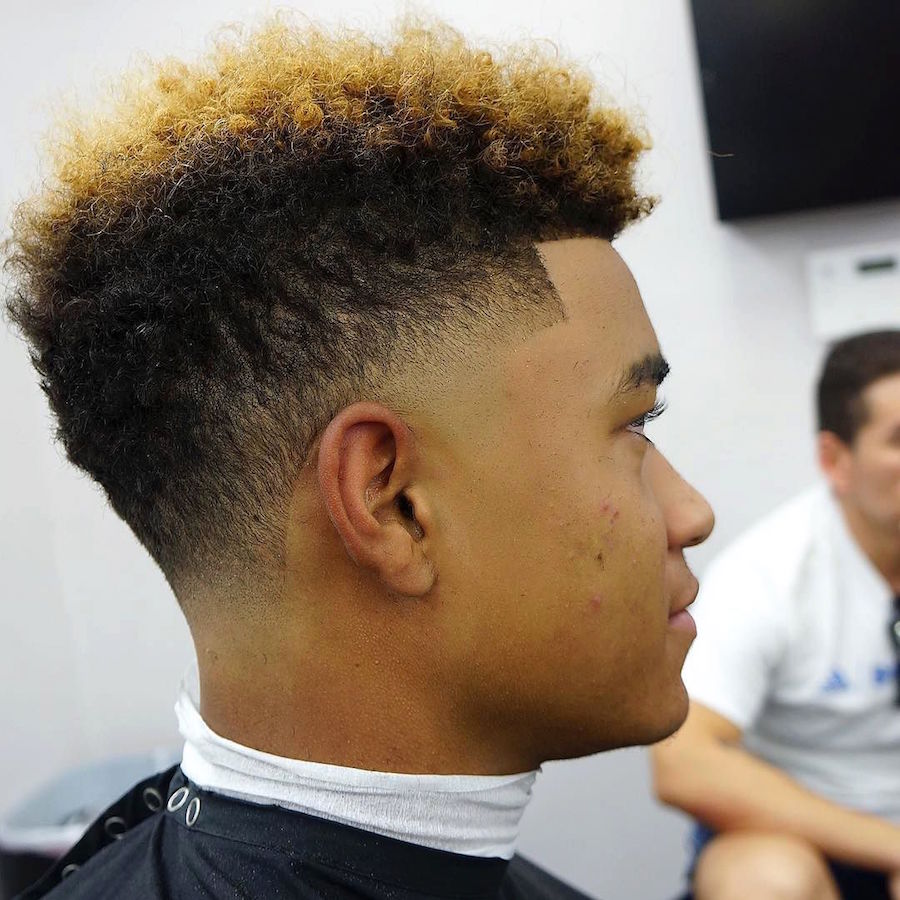criztofferson_and nice freshy taper fade curly hair