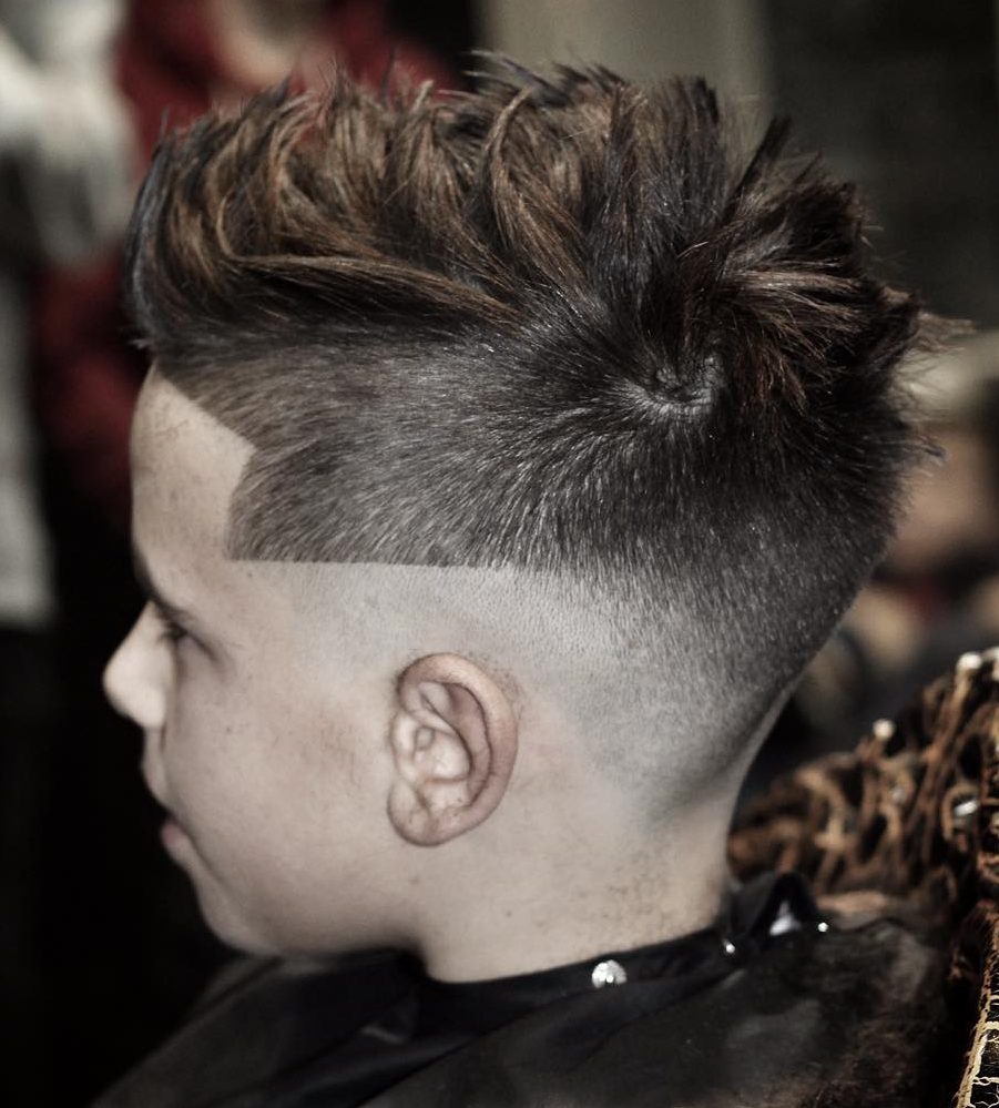 step fade haircut with textures for boys