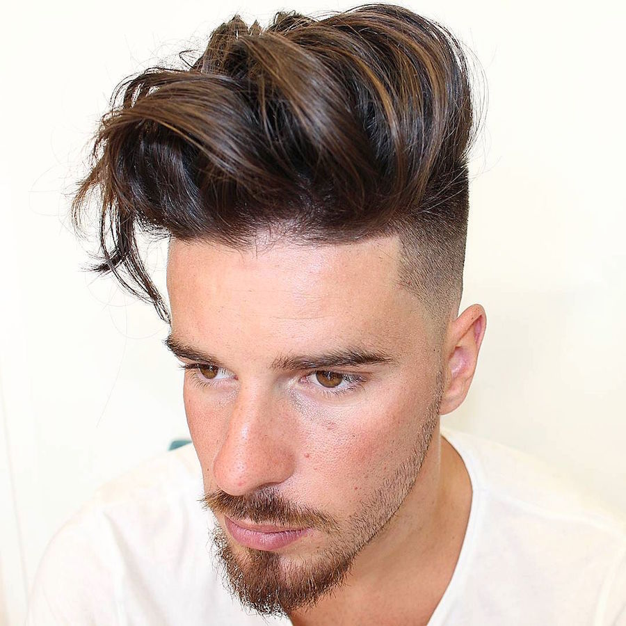 Long thick hair on top and high fade