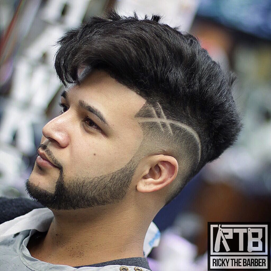 Thick hair on top and high skin fade with hair design