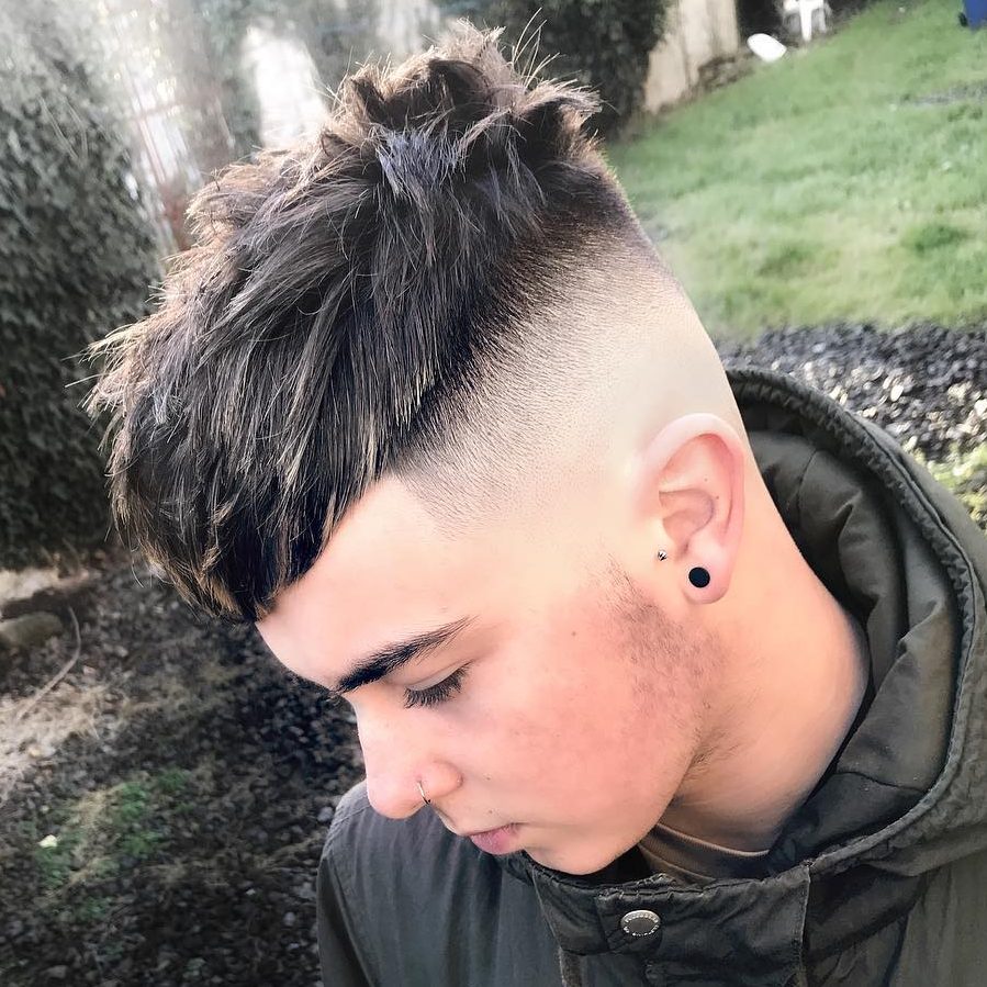 messy pompadour with shaved sides